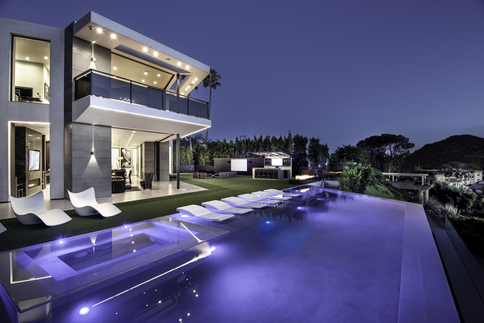 Infinity pool overlooking the city at night
