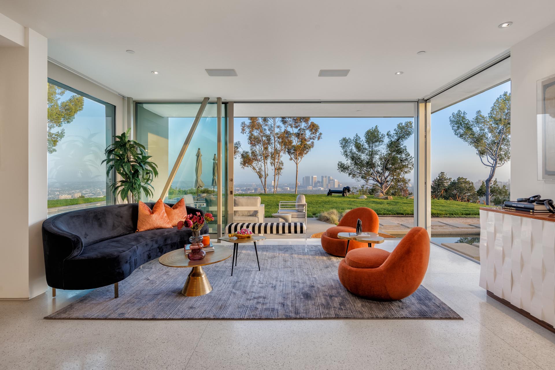Sunlit living room opening onto a terrace